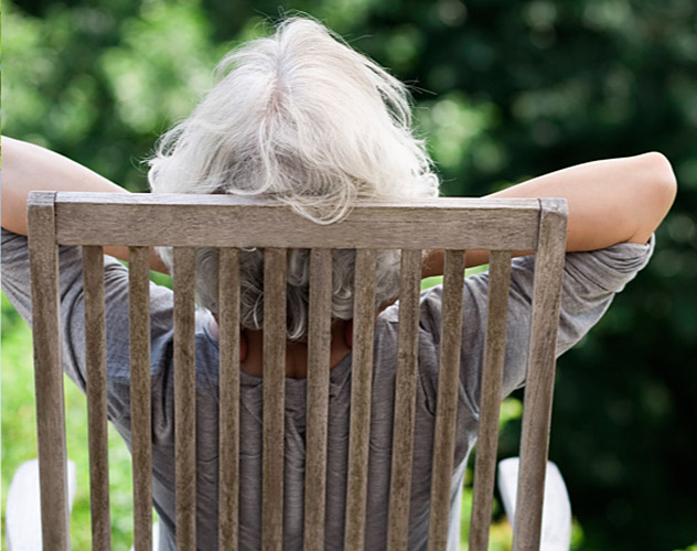 lady resting in a deck chair