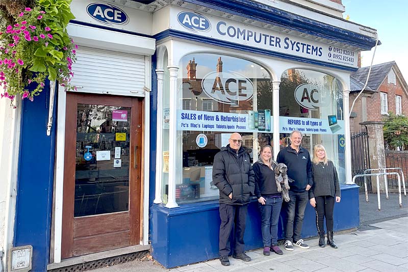 the ace computers team stand outside the newport shop