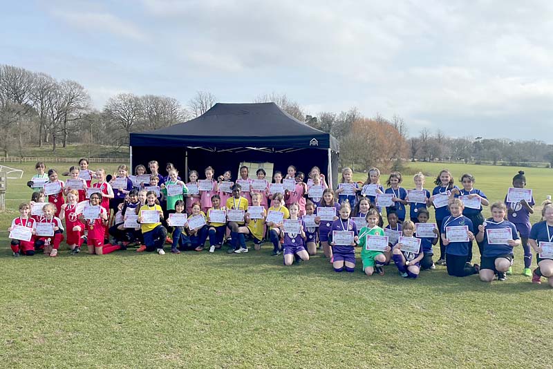 school girls take part in crossbar event