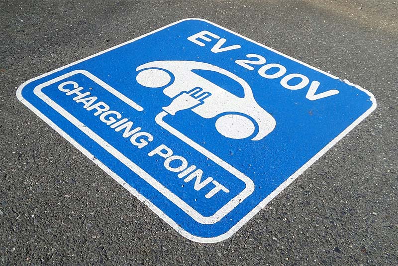 ev charging sign painted on the road in newport shropshire