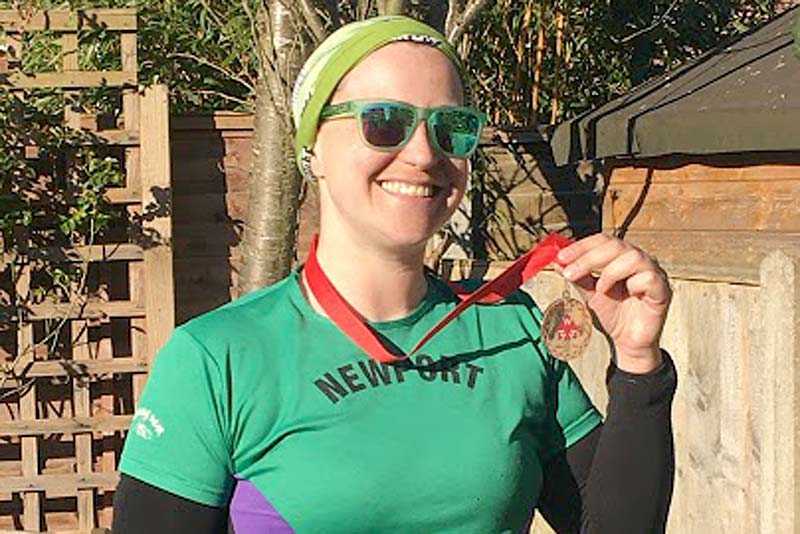 newport runner ellen with her medal