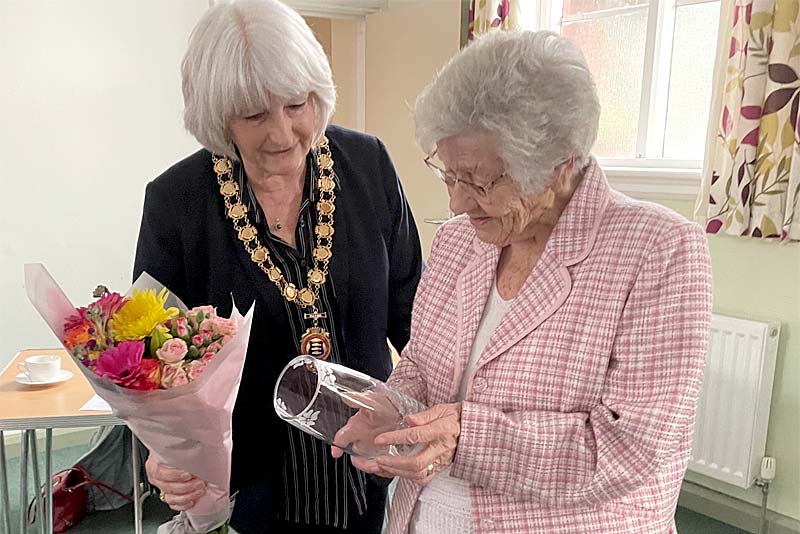 Eva Allan handed her award by Lyn Fowler