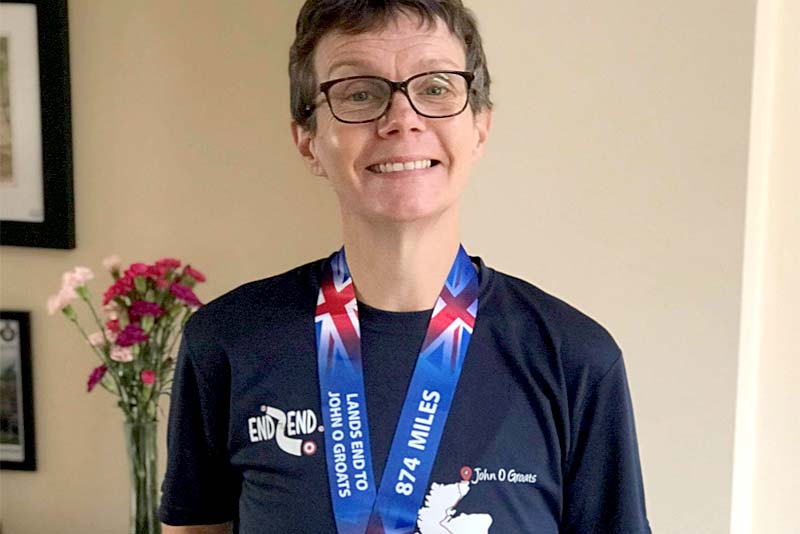 jo lutner with runners medal
