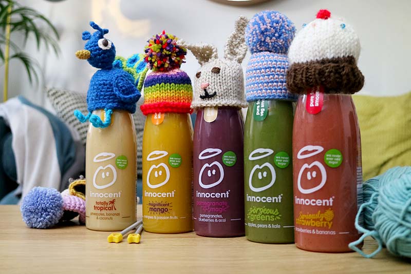 heather osbourne holding knitted bottle tops