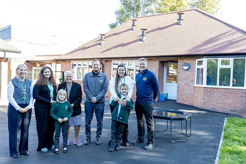 children and staff stand outside newport bungalow