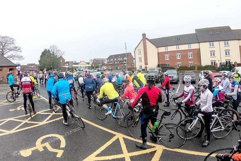 cyclists prepare to start bike ride