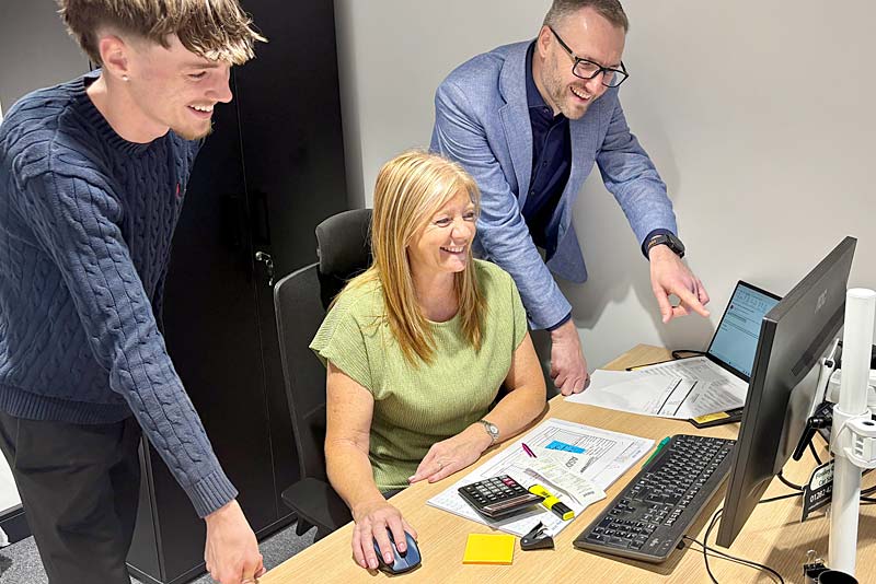 bespoke computing team work on dealership project