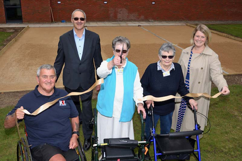 cutting the ribbon to petanque courts