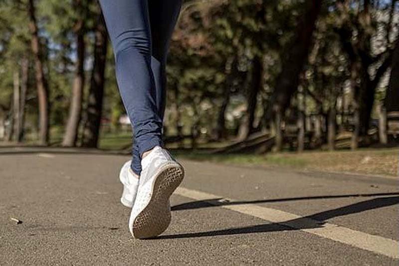 runner crossing the finishing line