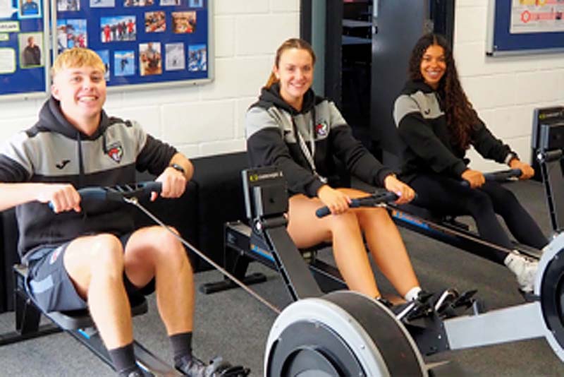 burton borough students on rowing machines