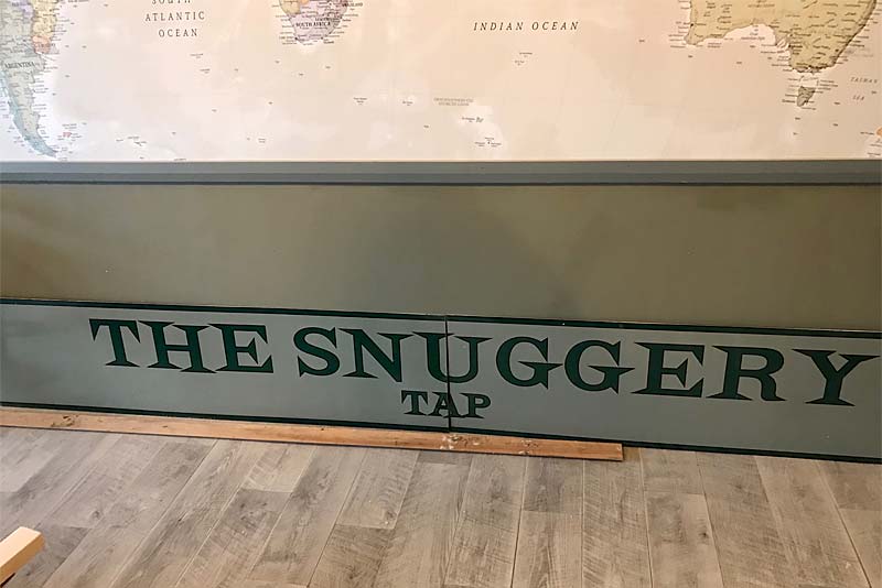 new sign at tghe snuggery tap